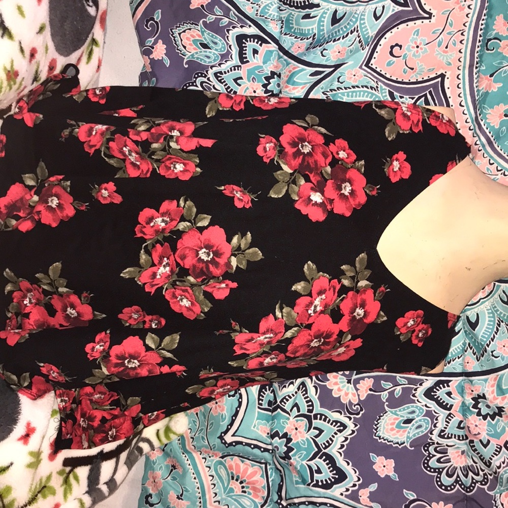 Red floral tank with black backdrop